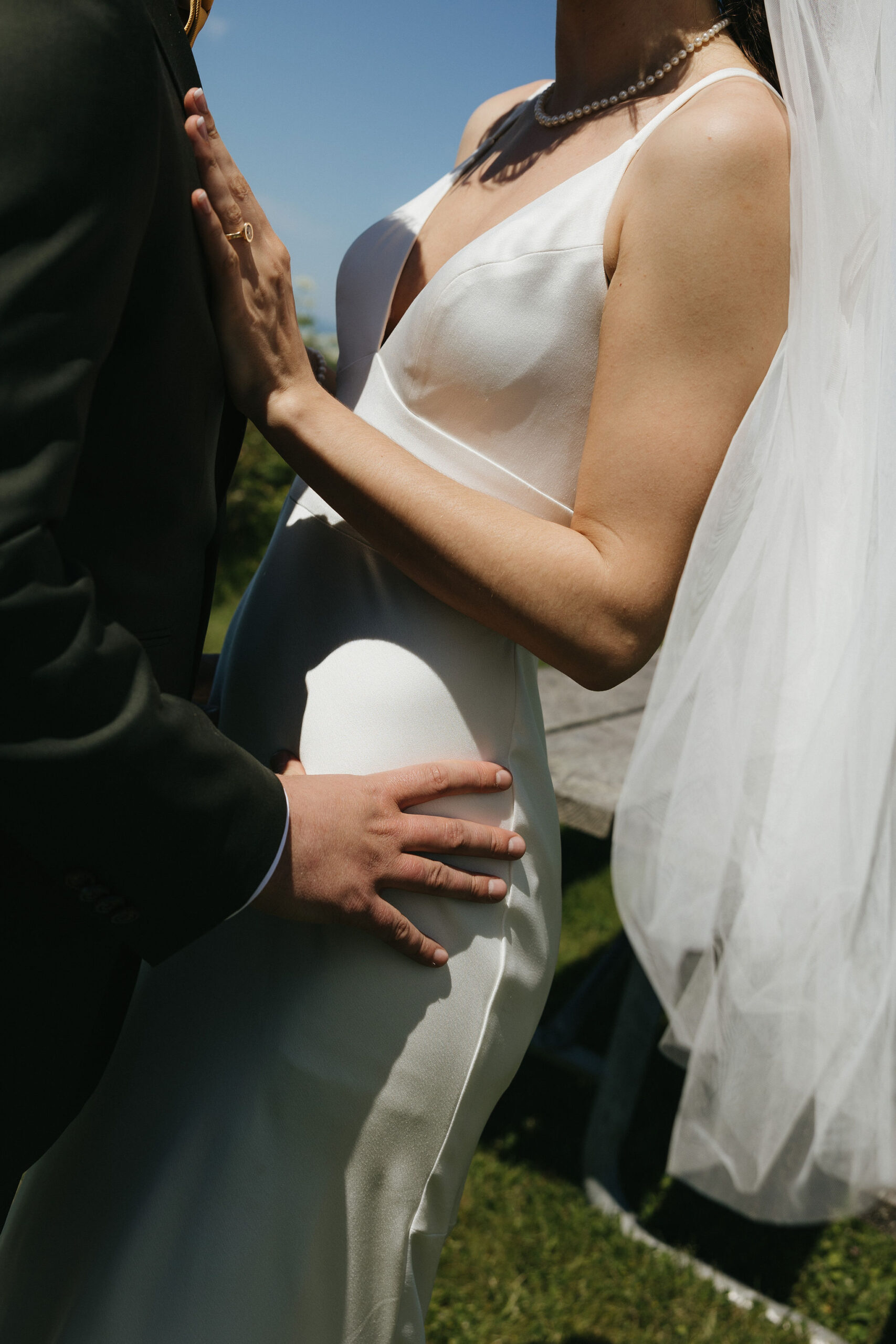 Bride and groom embracing eachother