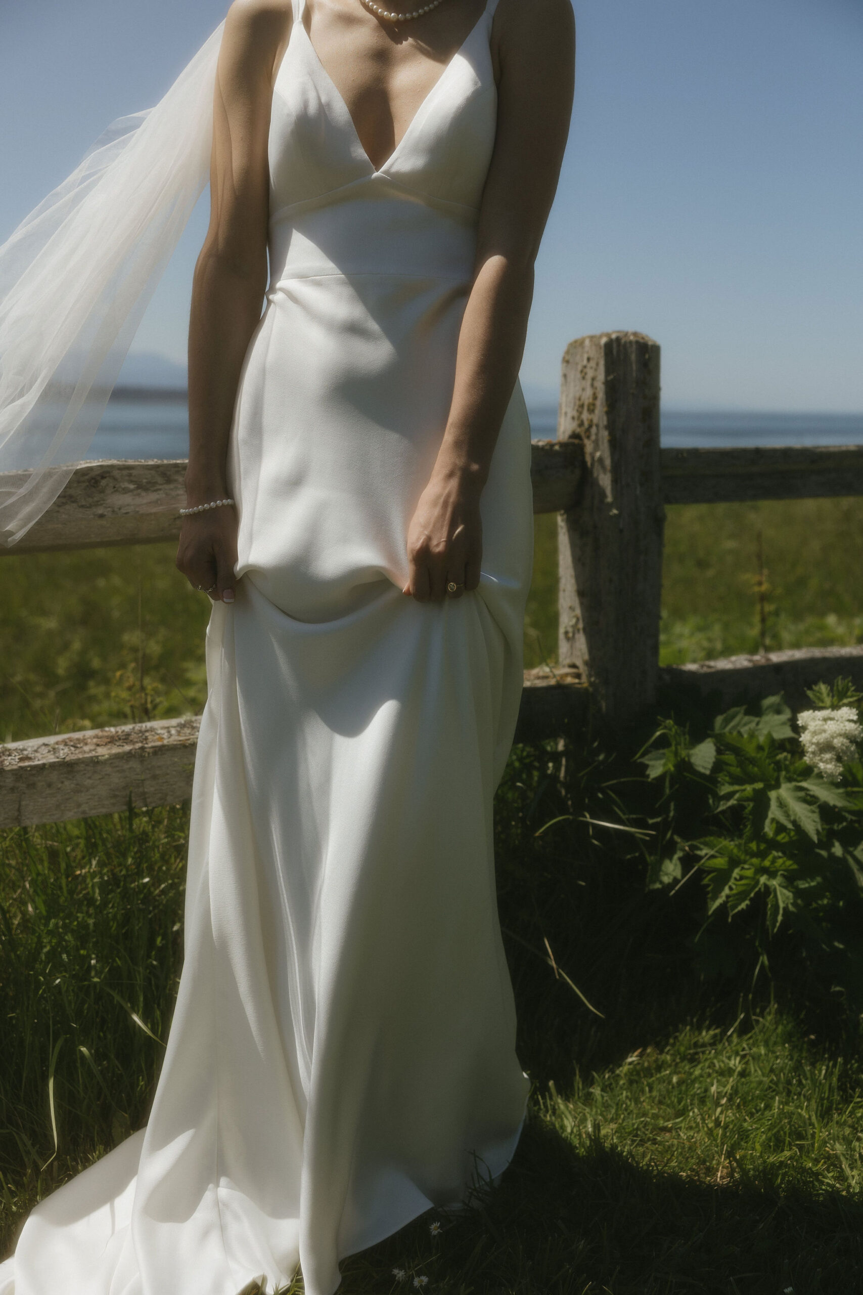 Bride posing in an A line wedding dress 