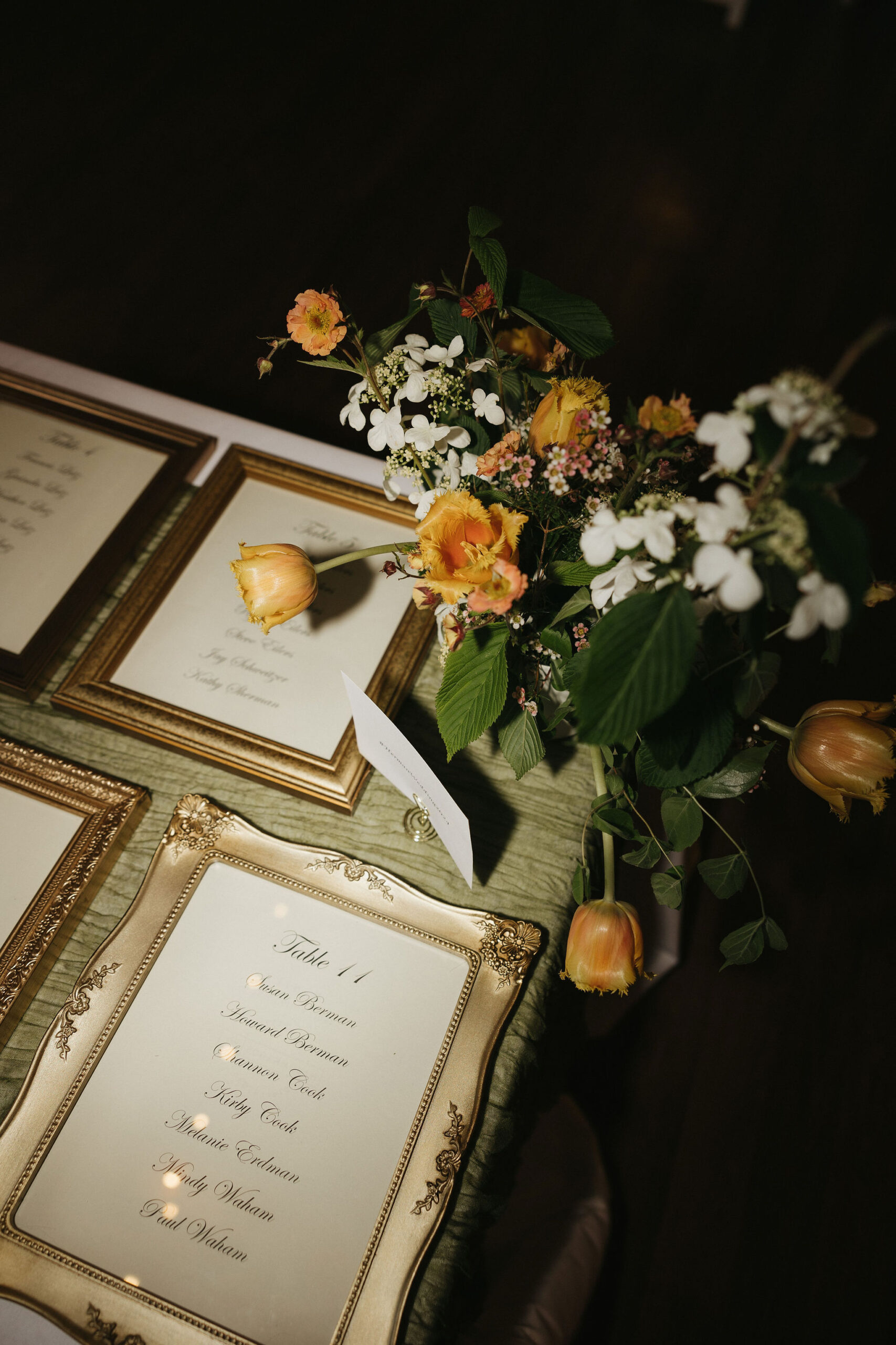 Colorful orange wedding florals