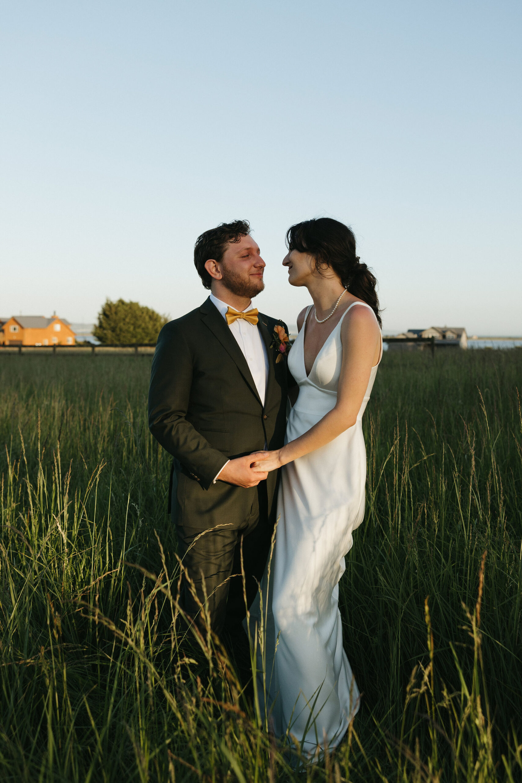 Bride and groom gazing into eachothers eyes at Whidbey Island wedding venue