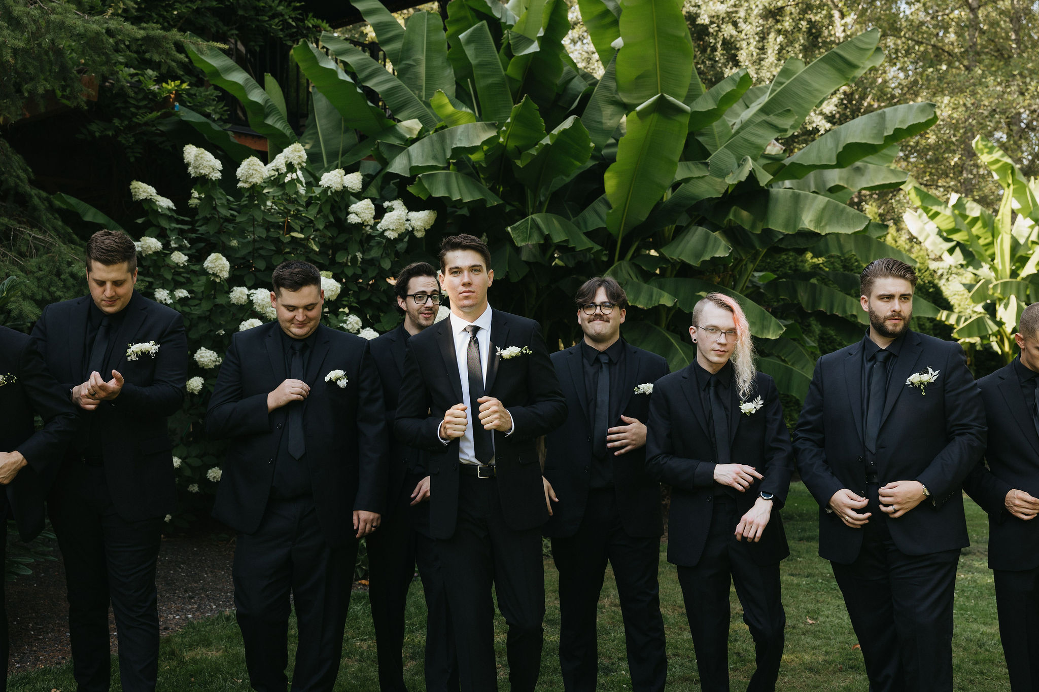 Groom and groomsmen posing at the Maroni meadows wedding venue