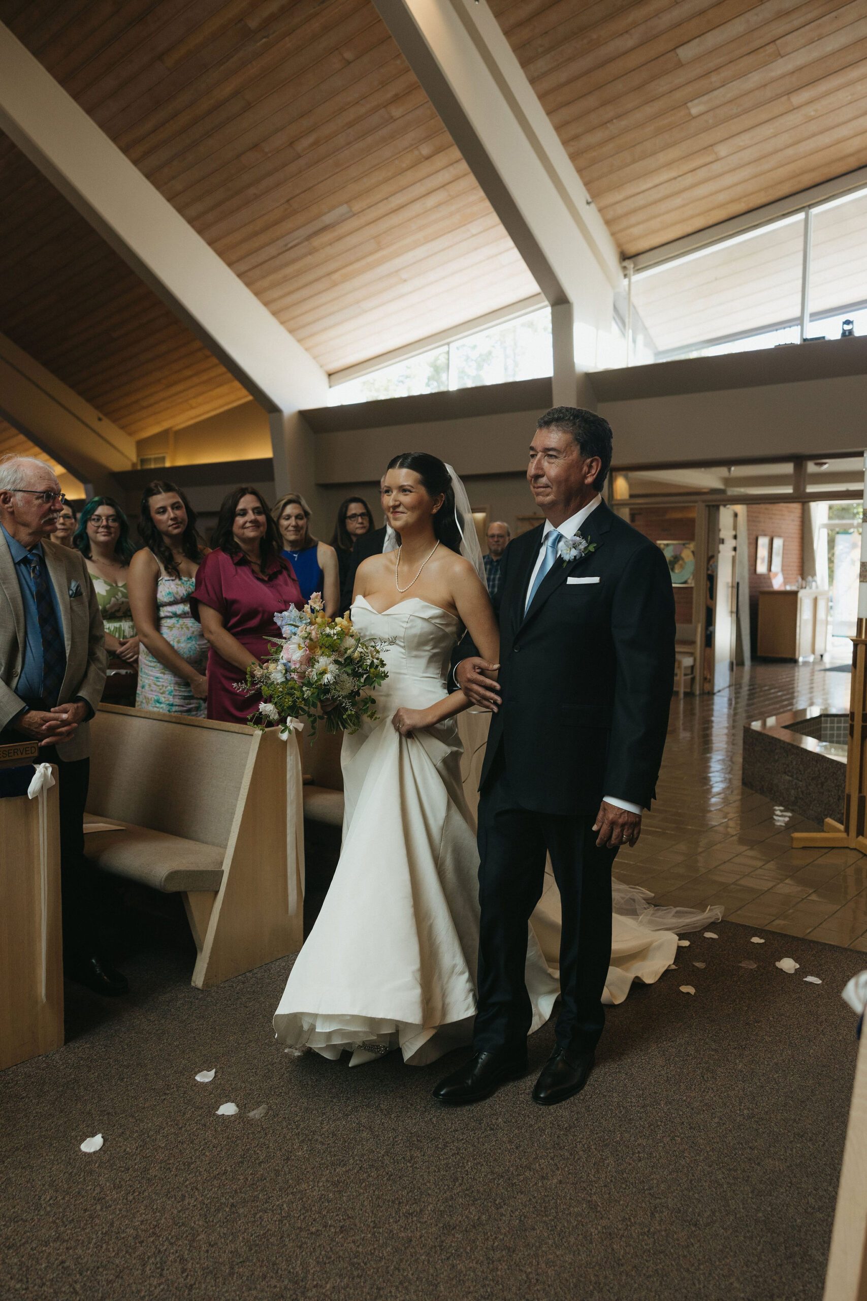 Father of the bride walking her down the aisle