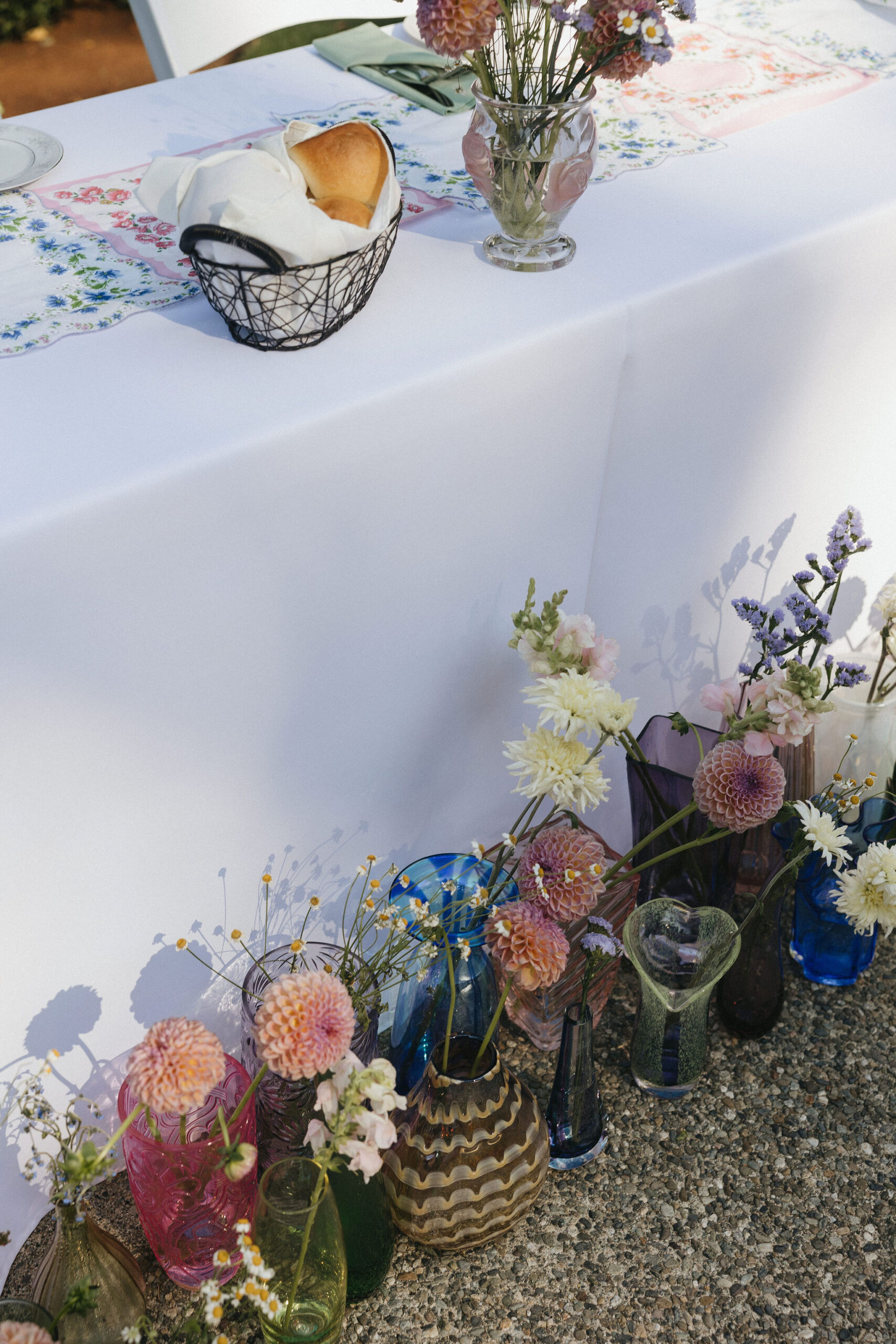 Sweetheart table adorned with multi colored florals