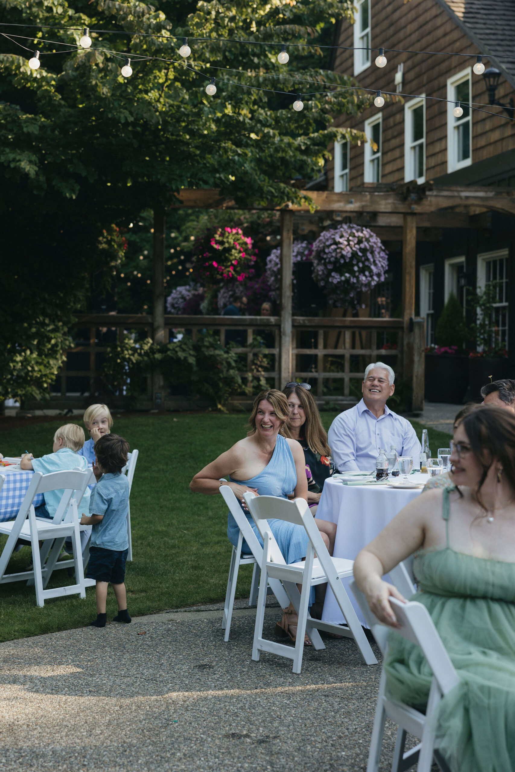 Wedding guests watching the bride and groom enter during their wedding reception