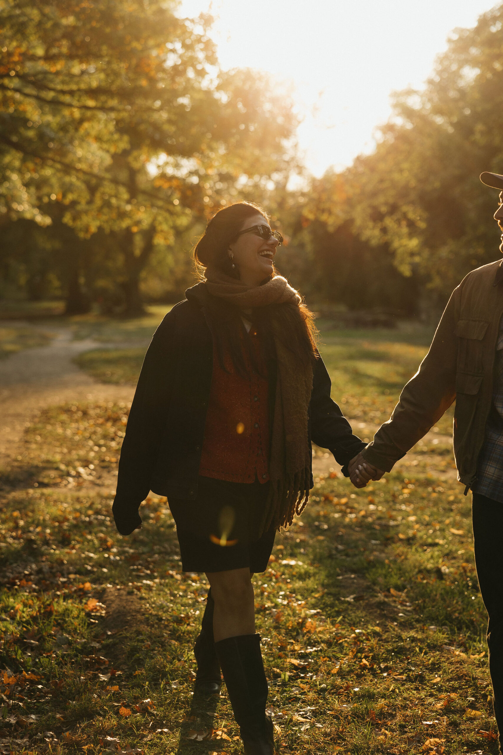 Greenpoint Loft Wedding sunset scene with the couple walking hand in hand through a park, enjoying the golden hour.





